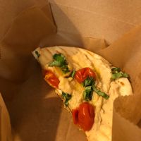 half of ne of the flatbreads at Lady and the Shallot in Ewing