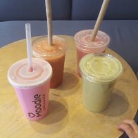 2 strawberry shakes (1 with almondmilk and 1 with coconutmilk), a Mr. Green and a Sweet bomb. Delicious. at Moodie in Warsaw