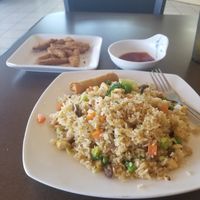 Happy times at Goji with Happy fried rice and Strips! at Goji Cafe in Dallas