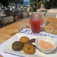Trio of colours potato cakes with spicy mayo & cherry carafe (all tasted different!)  at Pulse in Crete