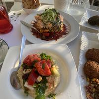 Hummus with Greek salad + whole foods salad   at Pulse in Crete