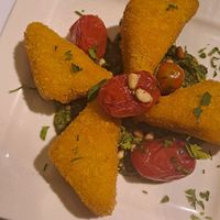 Polenta triangles with pesto at Pulse in Crete