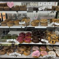 Display case of cookies, muffins, coffee cake and doughnuts   at Cake Girl in Los Angeles