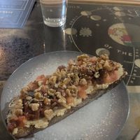 Tostada con Hummus at La Tienda de Los Unicornios in Granada