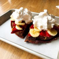 Vegan chocolate waffles with whipped coconut cream, banana, PB and strawberry at The Game Parlor in San Francisco