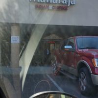 The restaurant is in a shopping area. at Maharaja in Charlottesville