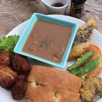 Fried soymear, curry, tempura vegetabes, bread. at Marugoto Vegan Dining Asakusa in Tokyo