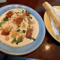 Chickpea dip with semi-dried tomatoes and rosemary focaccia   at Rococo in St Kilda