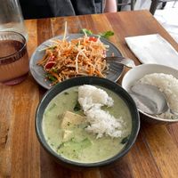 Papaya salad (tom yum) and green curry (gang garee). The curry was delightfully thick. at Kapunka Vegan in Paris