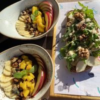 Two small bowls of açai + veggie tahini sandwich at Byoko in Malaga