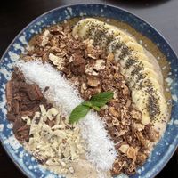 Amazing chocolate smoothie bowl with vegan chocolate on top!  at Byoko in Malaga