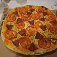 Delicious pizza with tomato and «pepperoni»  at Giusto Restaurante Vegano in Torrevieja