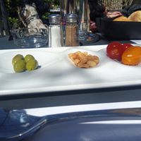 4 olives, 4 tomatoes and few peanuts... at Restaurant Comte Roger in Carcassonne