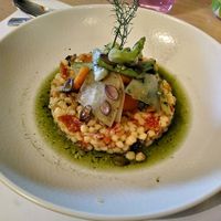 Sardinia pasta, summer vegetables, and spirulina at Restaurant Comte Roger in Carcassonne