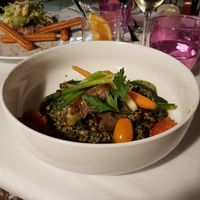 Grain dish with spirulina and cooked veggies at Restaurant Comte Roger in Carcassonne