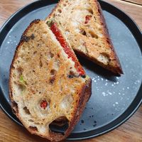 Olive tapenade, sundried tomato and avocado toasted sandwich at Hampton & Vouis in Manchester