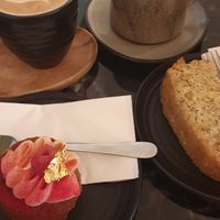 Lemon poppy loaf, rapberry tartlet, latte and beetroot latte at Hampton & Vouis in Manchester