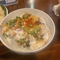 Dhaipuri: sev, puri, potatoes, onion, chili powder, chickpeas, vegan yogurt curd, coriander  at Masala Dosa Street Kitchen - MDSK in Phnom Penh