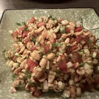 Peanut salad with tomatoes  at Masala Dosa Street Kitchen - MDSK in Phnom Penh