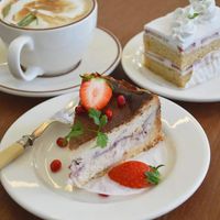 Strawberry baked cheesecake, GF strawberry and cream cake, and lavender soy latte. at Pyeongsangshi 평상시 in Seoul