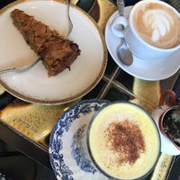 Coffee,Kurkuma Latte and Cake at vevi Café - vegan specialities in Cologne