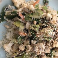 Vegan wok with rice, vegetables and saitan in cocomilk with sesame, cocos and sunflower seeds  at Abrigo da Alma in Tomar