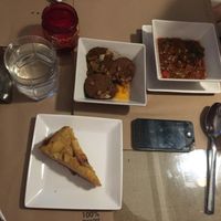 Tortilla de patata (potato "pie"), vegan chorizo and pisto (vegeable stew). very good. at BioWinds in Fuengirola