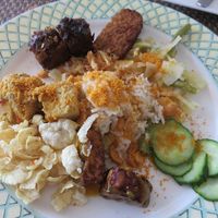 dishes from the ricetable on plate (photo from 2015) at Grand Hotel Opduin in De Koog