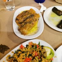 Pasus legumes (stuffed cabbage leaves) and tabouleh salad. at Noah's Ark in Kos