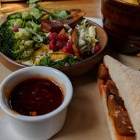 ROASTED AUBERGINE ROLL - miso sesame glazed aubergine, with a sweet chipotle dip and a kale & cauliflower couscous salad at The Fitzwilliam Arms in Peterborough