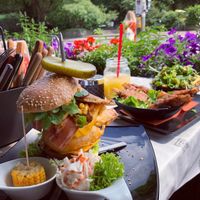 Burger, chicken wings and stacked chips! We shared this between two cos it was HUGE at Lily Burger Express in Berlin