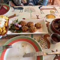 Patatas bravas with vegan garlic mayo. Corn fritters. Garlic mushrooms. Also had bread and padron peppers. Forgot to take a picture of my puddingg  at Red Squirrel Tapas Bar in Anglesey