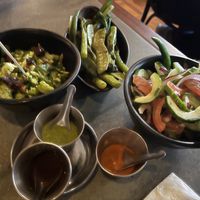 kachumber, chilli broccoli salad, bowl of greens  at Dishoom - Carnaby in London