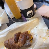 Doesn’t look that great but it was…. a vegan croissant with cheese, burger and a Fall coffee with maple syrup and cinnamon   at Gregory's Coffee - 7th Ave in New York City