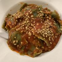 Vegan ravioli with “hazelnut sauce” (tomato sauce with hazelnuts?) - medium size quite filling at Pastificio Artigianale di Canneto in Genoa