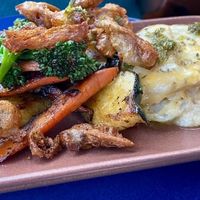 Potato cheese gratin with crispy mushrooms at Om Sabor in San Francisco