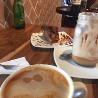 Coconut milk coffees and cake at 7 Campanarios Cafe del Ecuador in Quito
