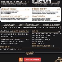 Schaller’s stube menu— the white area is the Beyond Sausage vegan menu. The German potato salad, cucumber salad, and MAYBE the soft pretzel are all vegan side options. at Schaller's Stube in New York City