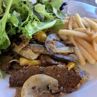 Seitan on a plate with fries.  at Villa 6 in Sintra