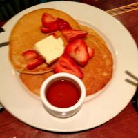 Double Stack:
Four plain pancakes. $6.95 
Four specialty pancakes. $8.95 
Add-Ons Add strawberries, almonds, walnuts, whipped cream or chocolate syrup to pancakes or French toast for 50¢ apiece.  at Ethos Vegan Kitchen in Winter Park
