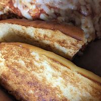 vegan lasagna with garlic bread at Ethos Vegan Kitchen in Winter Park