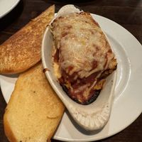 Lasagna with garlic bread   at Ethos Vegan Kitchen in Winter Park