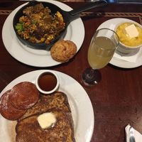 Scramble with biscuits and grits; french toast with Canadian bacon and apple mimosa from the brunch menu! at Ethos Vegan Kitchen in Winter Park