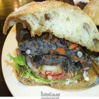 Samson Burger - vegan black bean burger with lettuce, tomato,red onion, pickles, sprouts, spicy mustard, ketchup & veganaise. at Ethos Vegan Kitchen in Winter Park