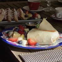 Breakfast burrito and waffles in the back  at Number 10 in Willemstad