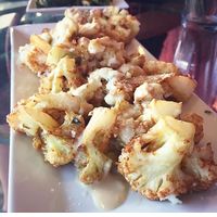 the garlicky cauliflower, pic from plant based asheville food blogger “Gypsy Queen never disappoints” at Gypsy Queen in Asheville