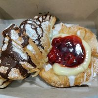 Chocolate filled croissant and cherry Danish at Vegan Danish Bakery in Toronto