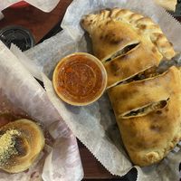 Calzone and single garlic knot  at Bodacious Bakehouse in Virginia Beach