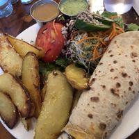 Chapati dog with vegan cheese! A favorite! at The Naam in Vancouver