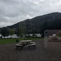 Sight from Restaurant to the tables outside at Glenfinnan House in Glenfinnan